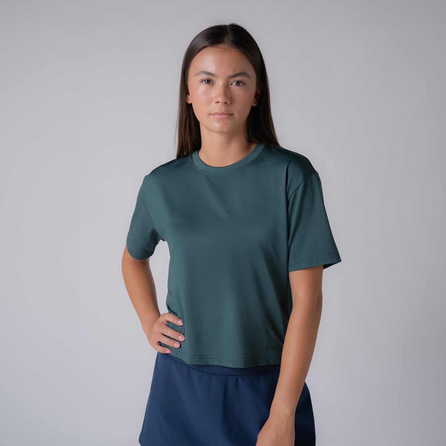 Joola Womens Court Crop Tee Fall in club green, front view hero shot of athletic apparel