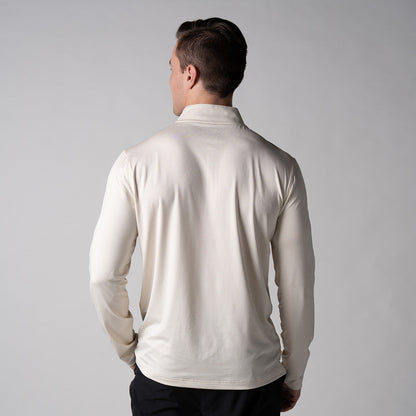 Gray background, image showing the back of a male model wearing a JOOLA Men's Quarter Zip Pullover, sandstone color.