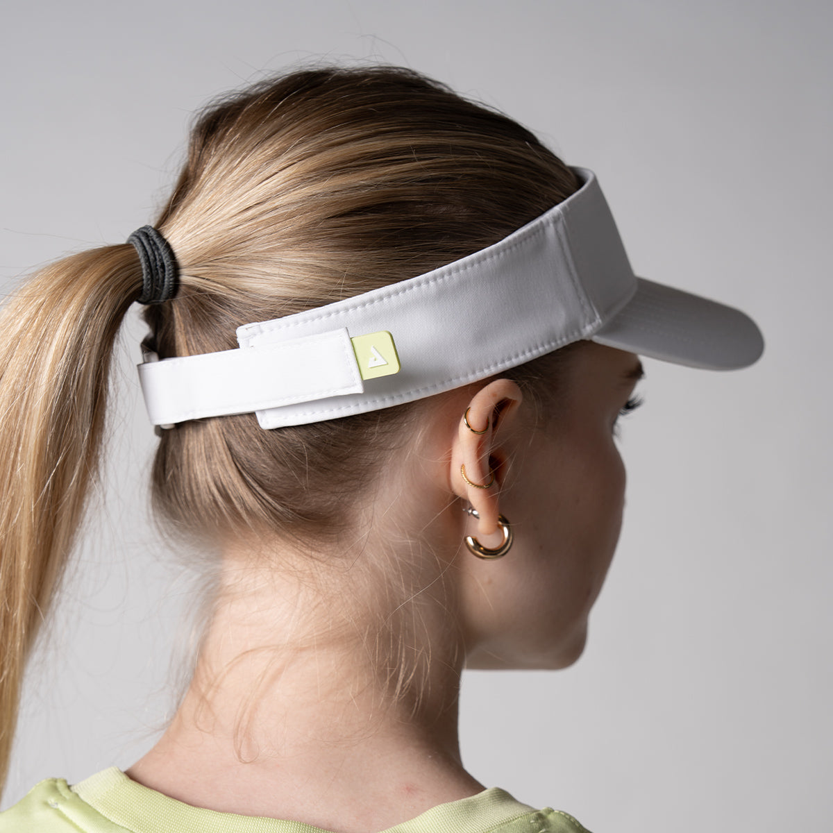 Close up image of the back of a JOOLA unisex visor.