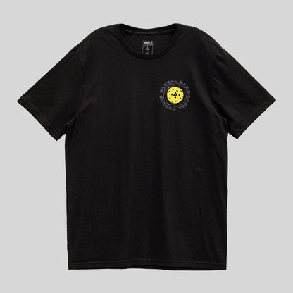 Gray background, black JOOLA graphic tee with yellow pickleball over the left breast.