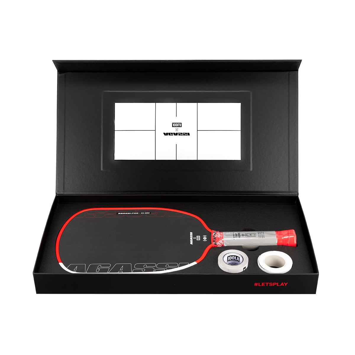 Pickleball paddle and ball set in a black box with a visible brand logo.