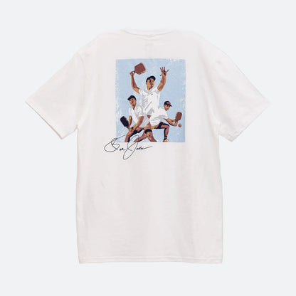 Gray background, product image of the JOOLA Ben Johns illustrated graphic tee.