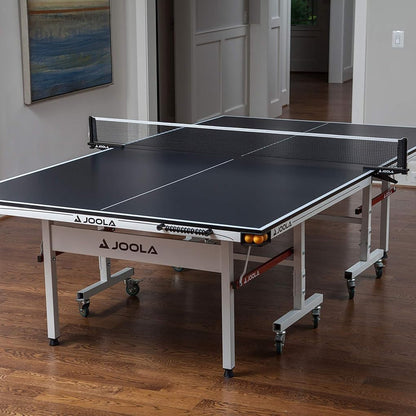 Image showing the JOOLA Rapid Play indoor table tennis table set up inside.