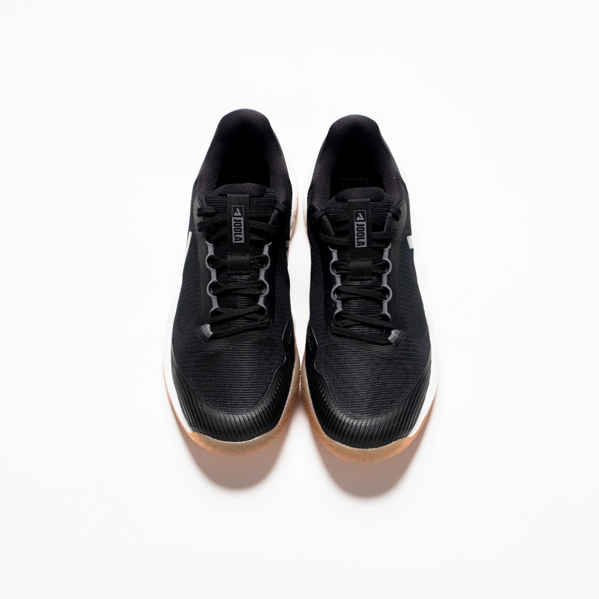 White background, product image of a pair of Men's R4LLy pickleball shoes, black, with gum sole.