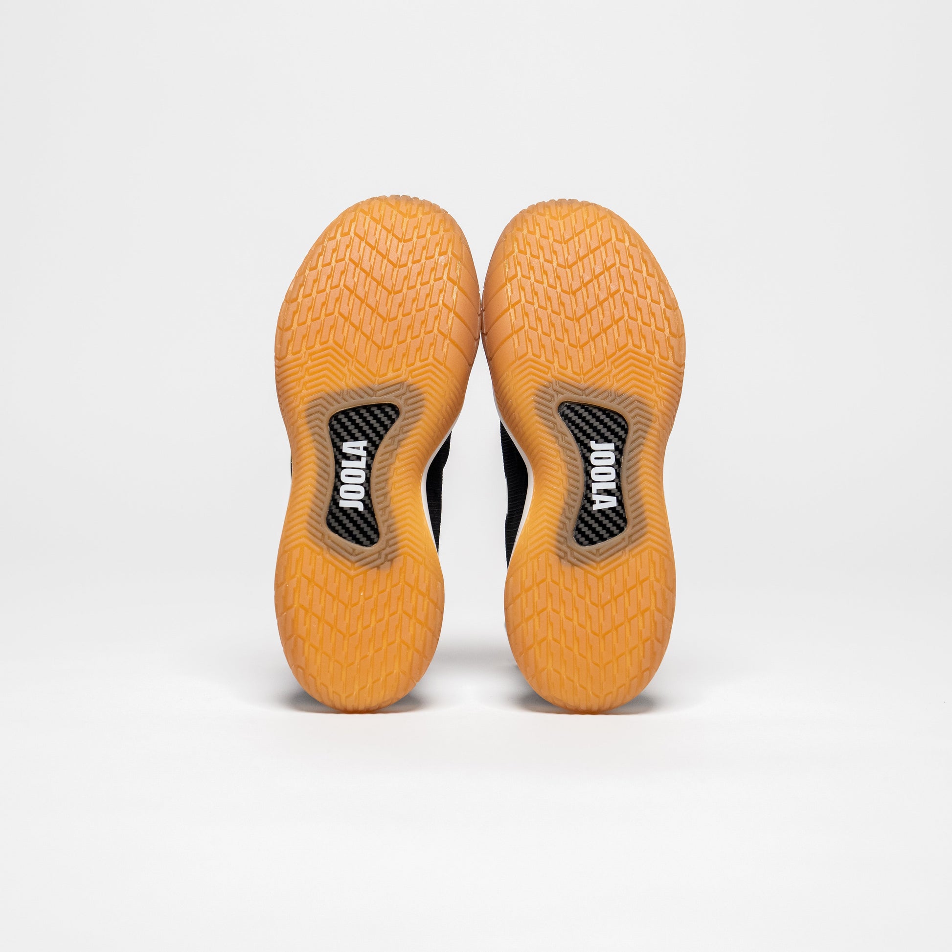 White background photo image of a pair of JOOLA R4LLy Men's Black shoes with gun sole.