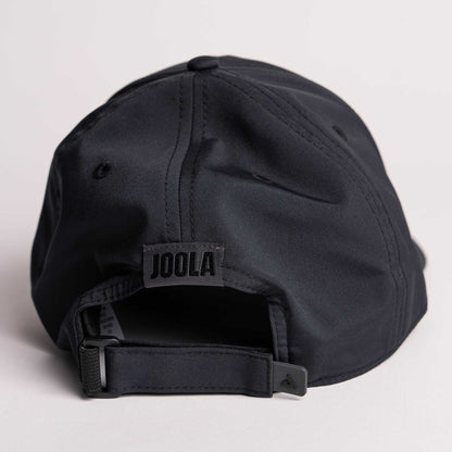 White background, product image showing the back of a JOOLA Essential Cap, black.