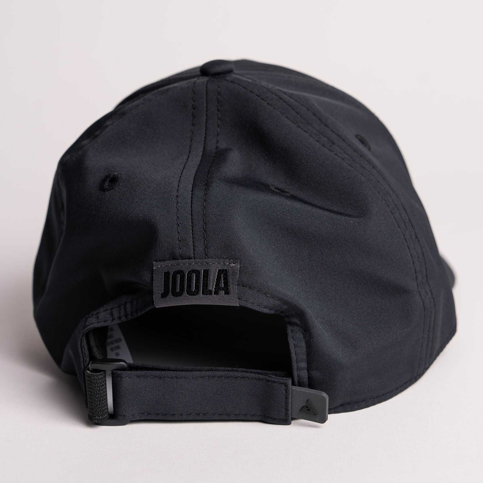 White background, product image showing the back of a JOOLA Essential Cap, black.