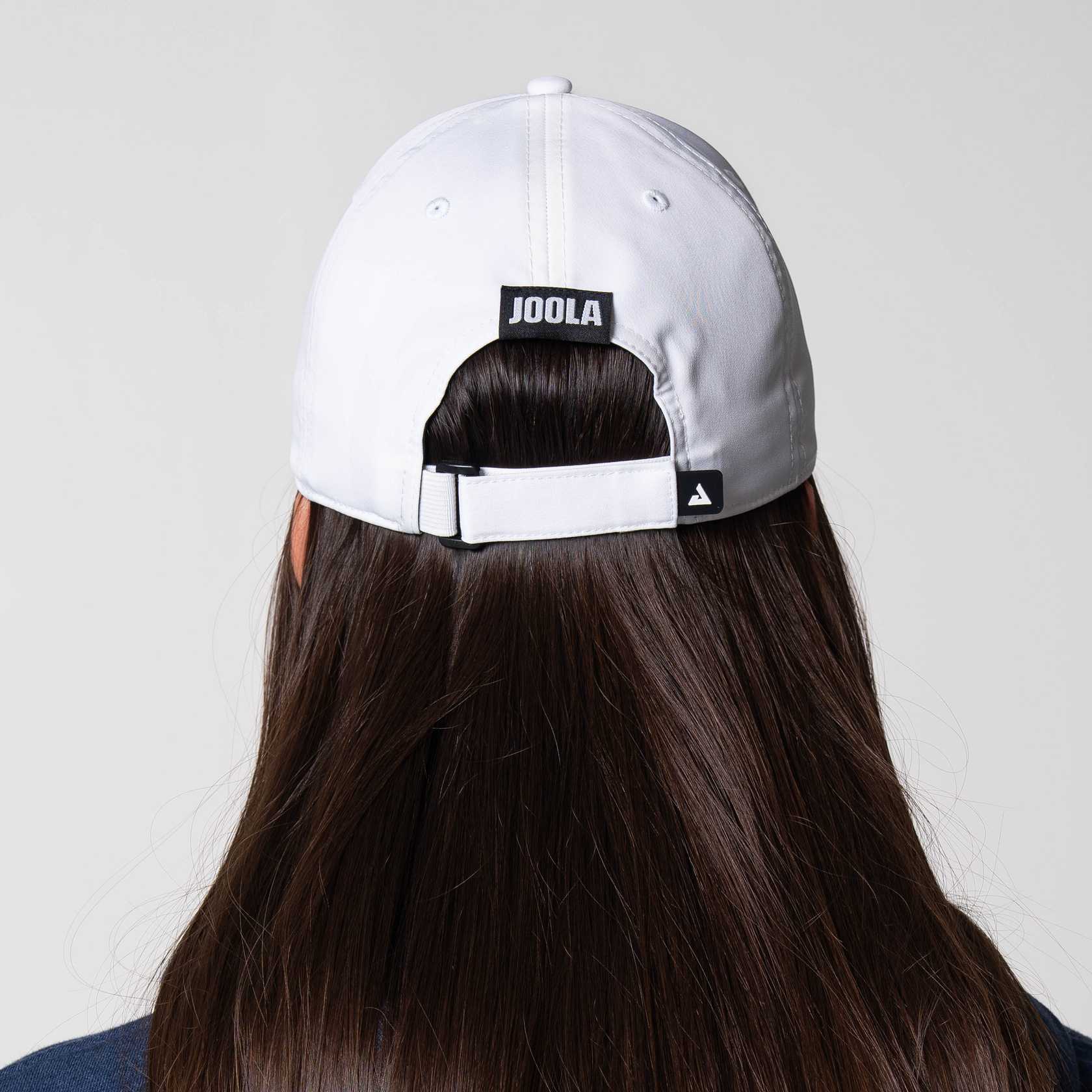 Image showing the back of a JOOLA Essential Cap, white with black branding.