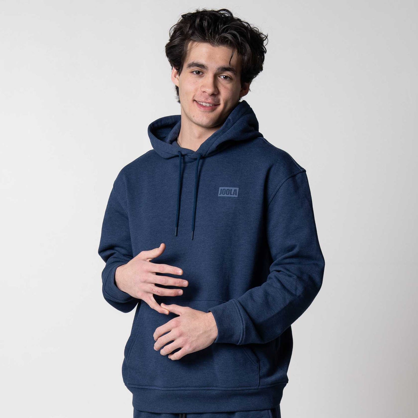 Joola Unisex Fleece Hoodie 1 in navy color displayed on model, front view showcasing sport design and style