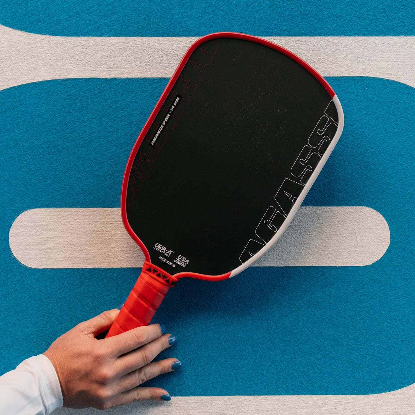 Joola Agassi Pro 14mm Pickleball Paddle front view showing paddle face and grip design