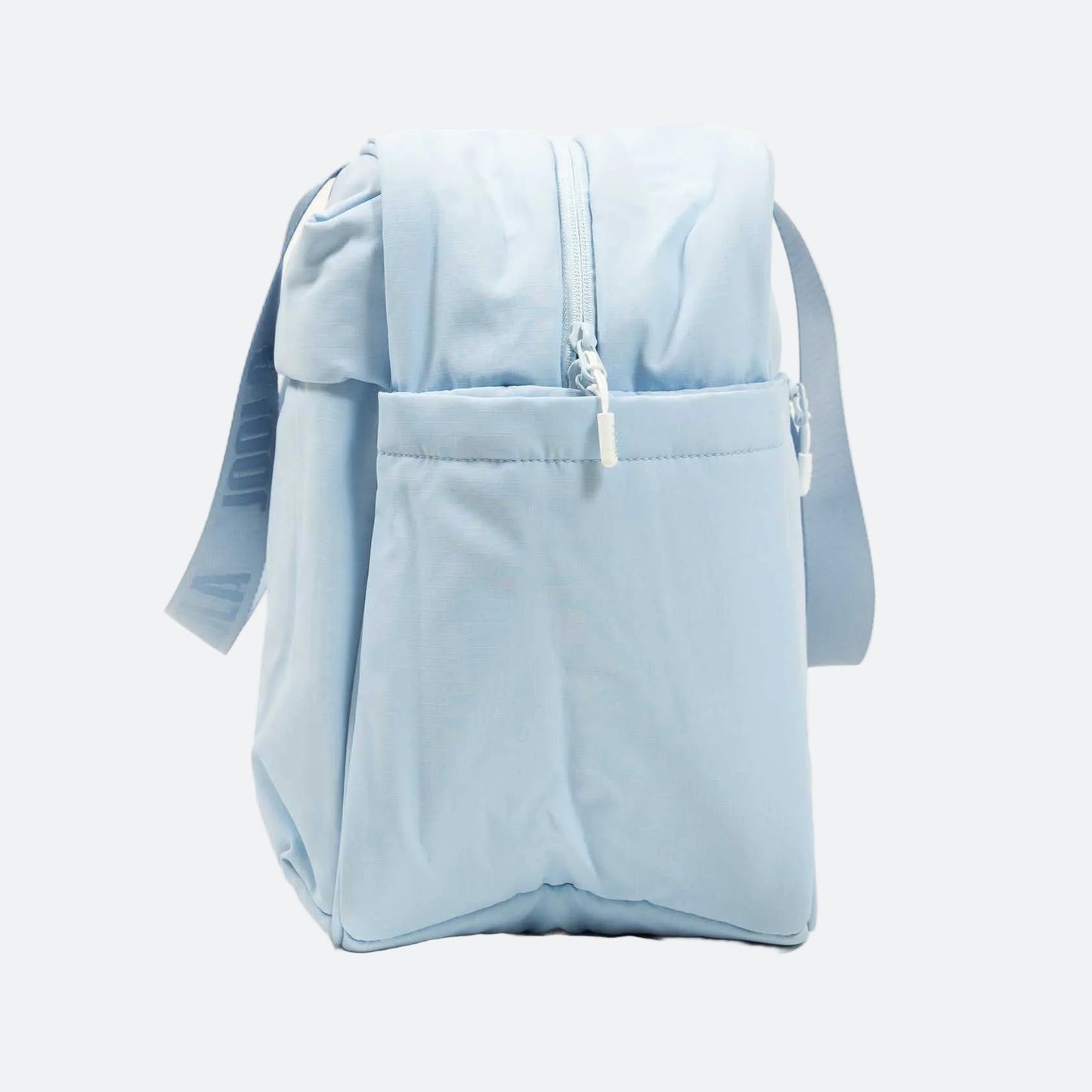 Light blue backpack with a front pocket on a white background