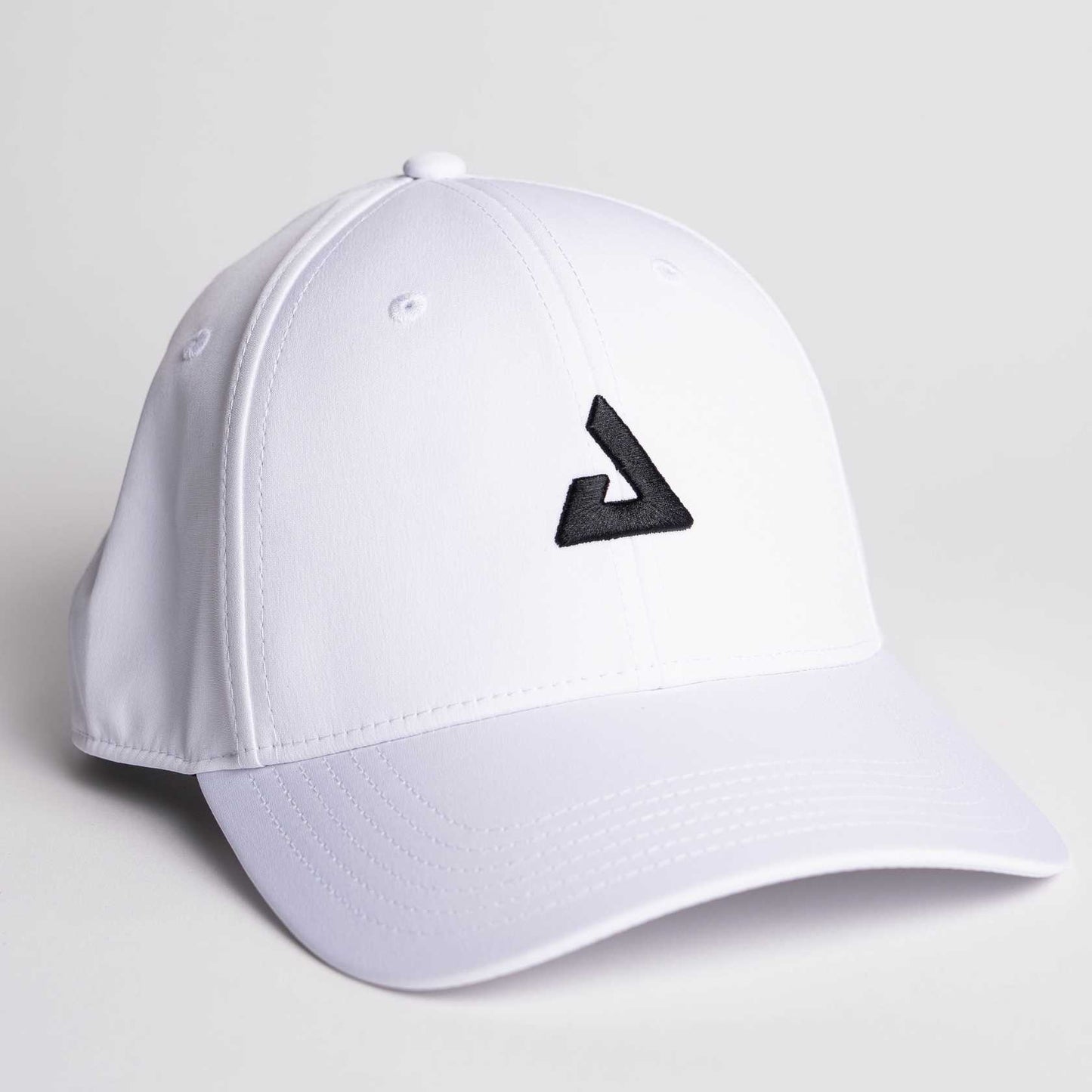 White background, product image of a JOOLA Essentials Cap, White with black JOOLA Trinity logo.