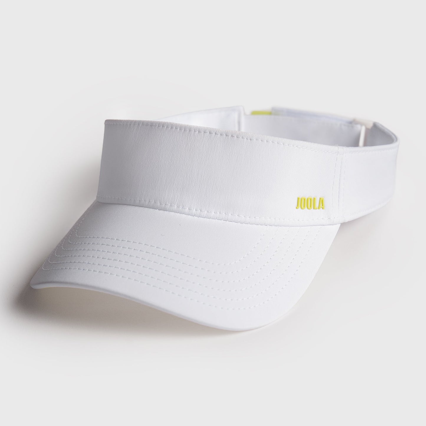 White visor with a JOOLA brand logo on a light gray background