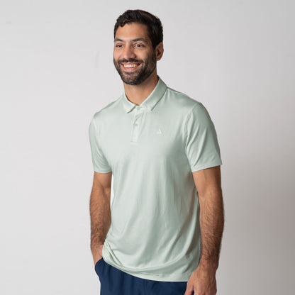 Image showing a male model wearing a JOOLA men's club polo, hushed mint.