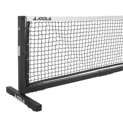 White Background Image: Closeup shot of the left half of the JOOLA Pro Pickleball Net. Net has stationary legs and the net features a side hand crank with steel cable stabilizing system.