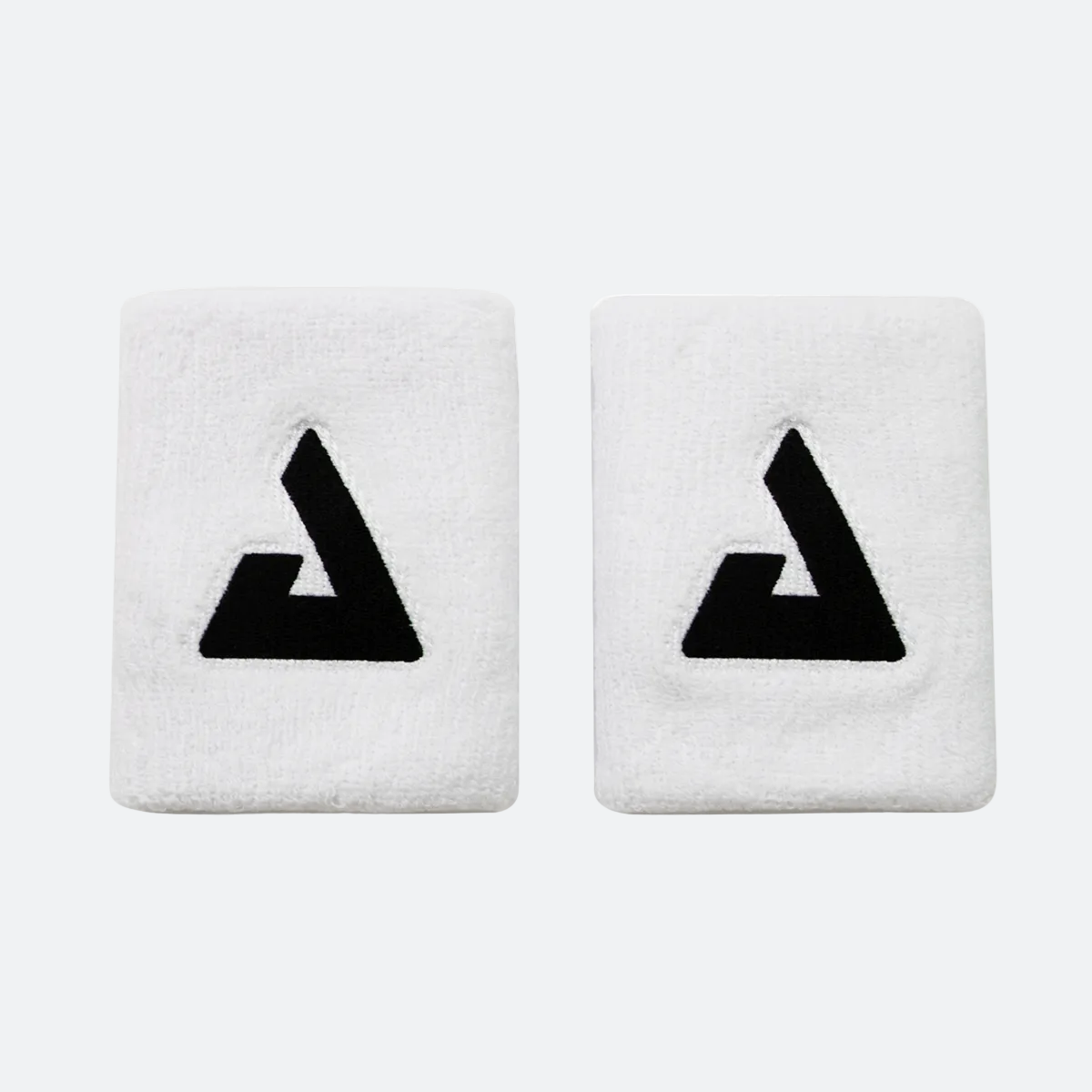 Product image of two white JOOLA Trinity Wristbands with the black Trinity logos showing