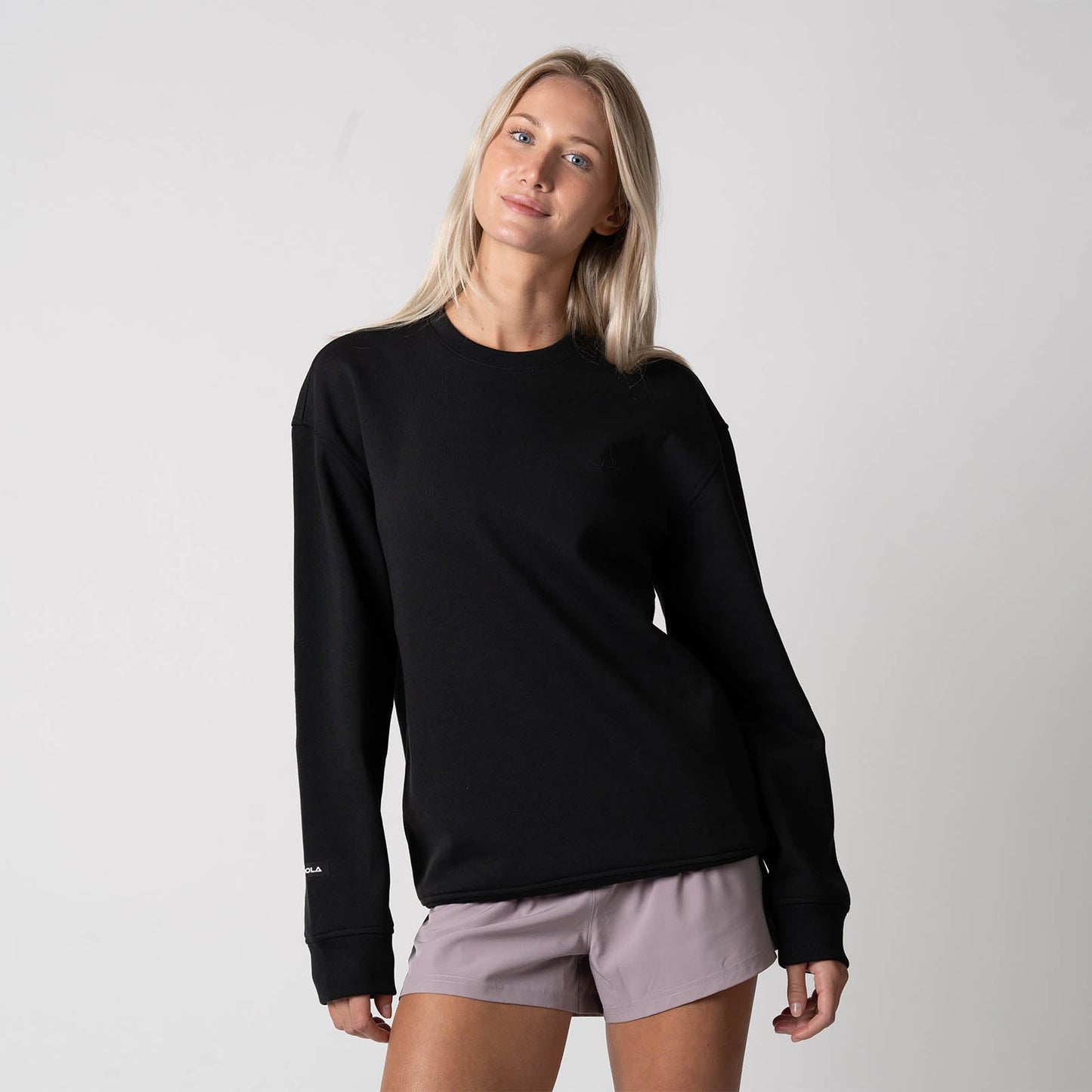 Joola Unisex Fleece Crew Table Tennis Sweatshirt in black, front view on model