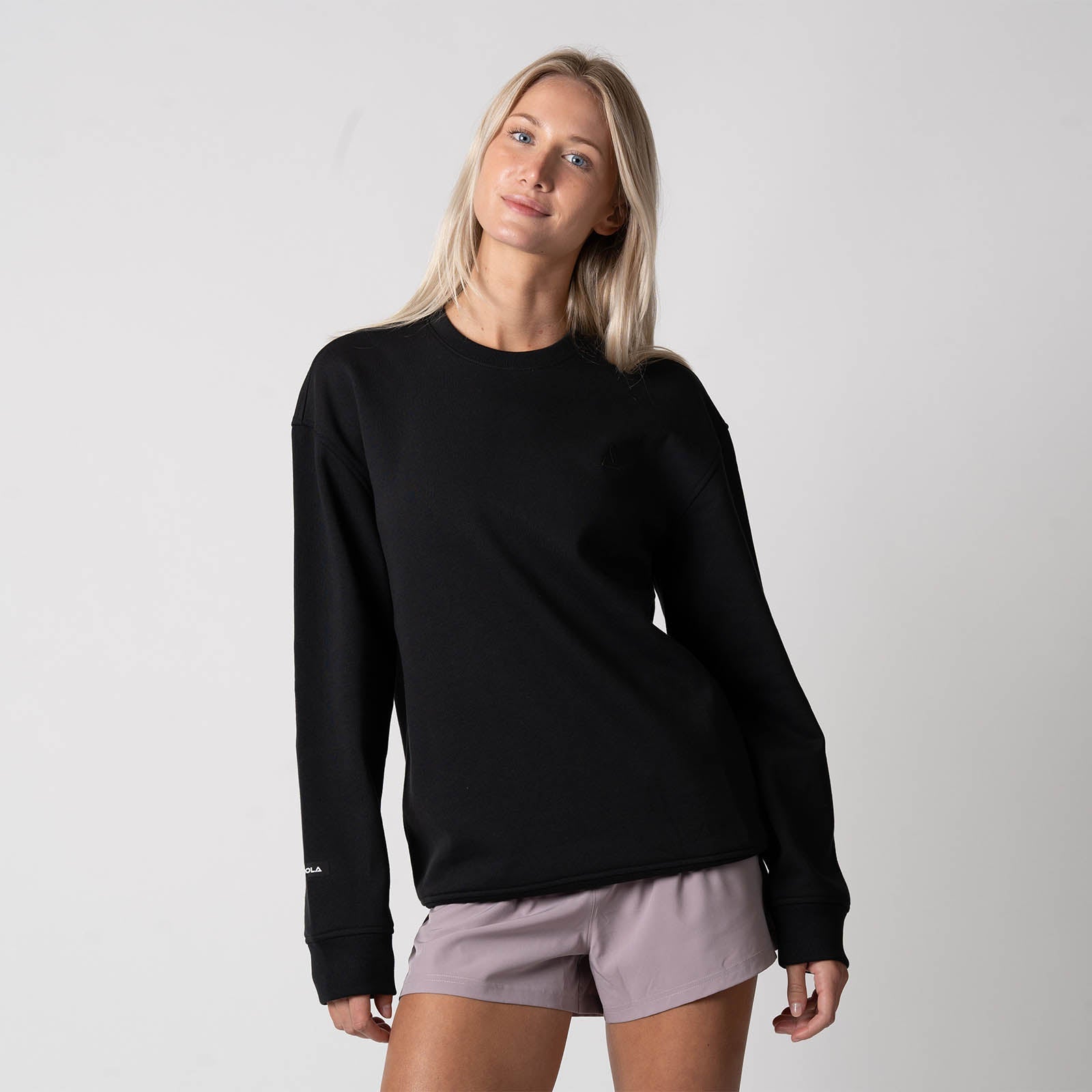 Joola Unisex Fleece Crew Table Tennis Sweatshirt in black, front view on model